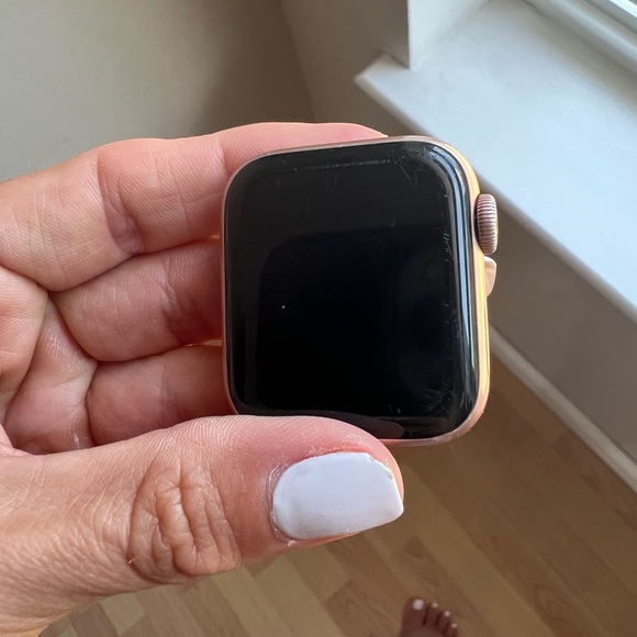 Apple watch series 4 40 mm. Has scratches on face as shown. All bands included - Picture 4 of 8